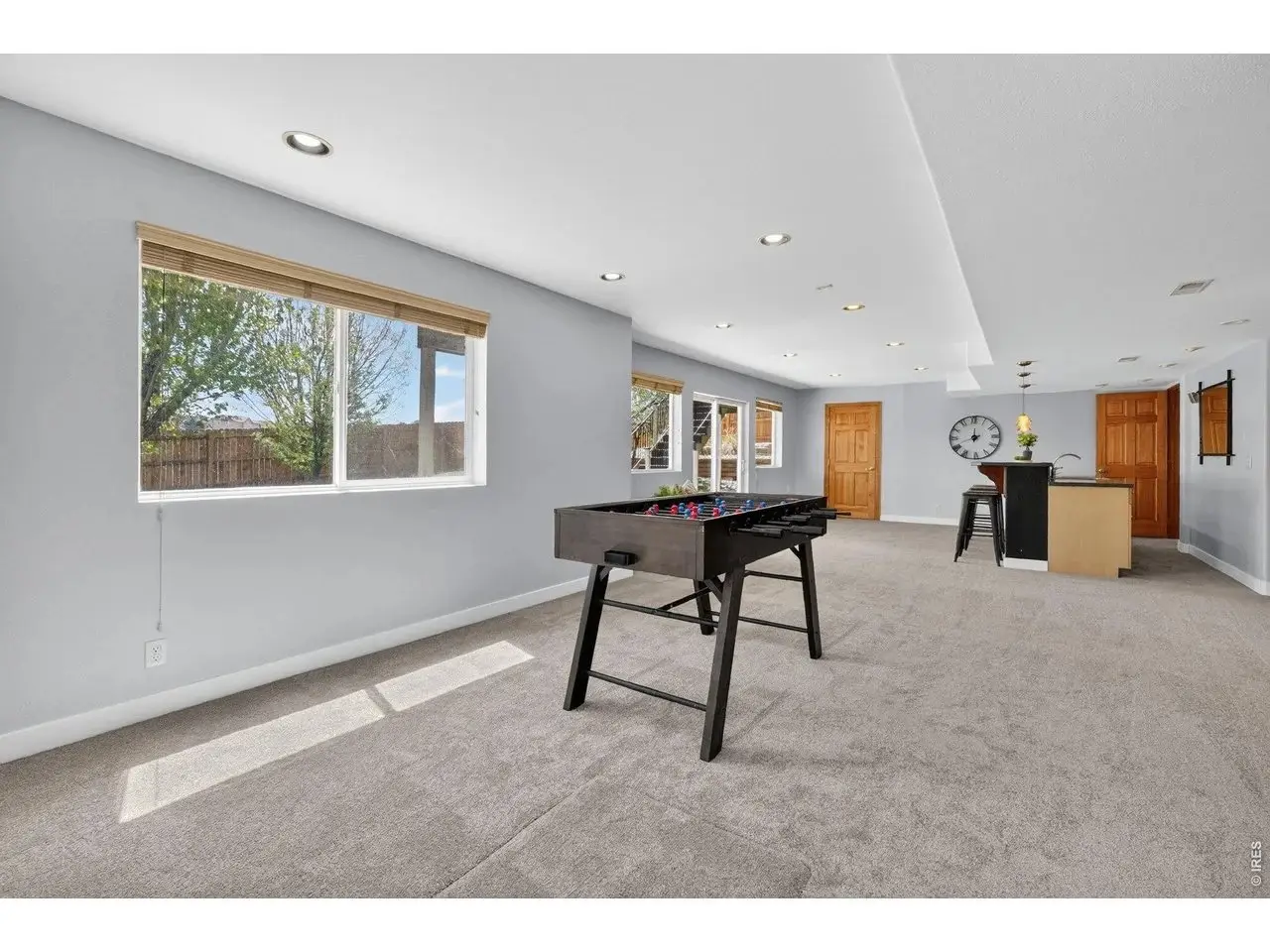 basement walk out entertaining space styled by STS Boulder Foothills
